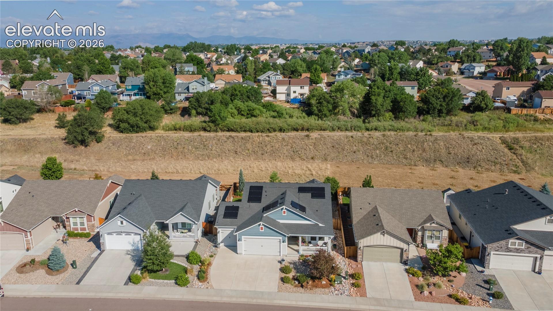 Enjoy the Open space with trails behind the home