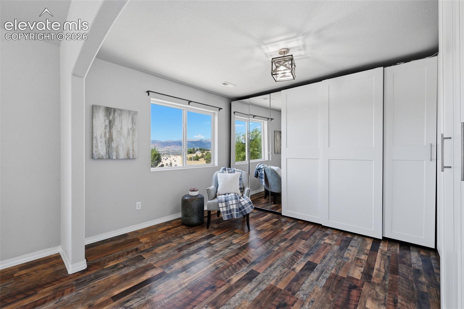 Sitting room with tree house views in your master retreat!