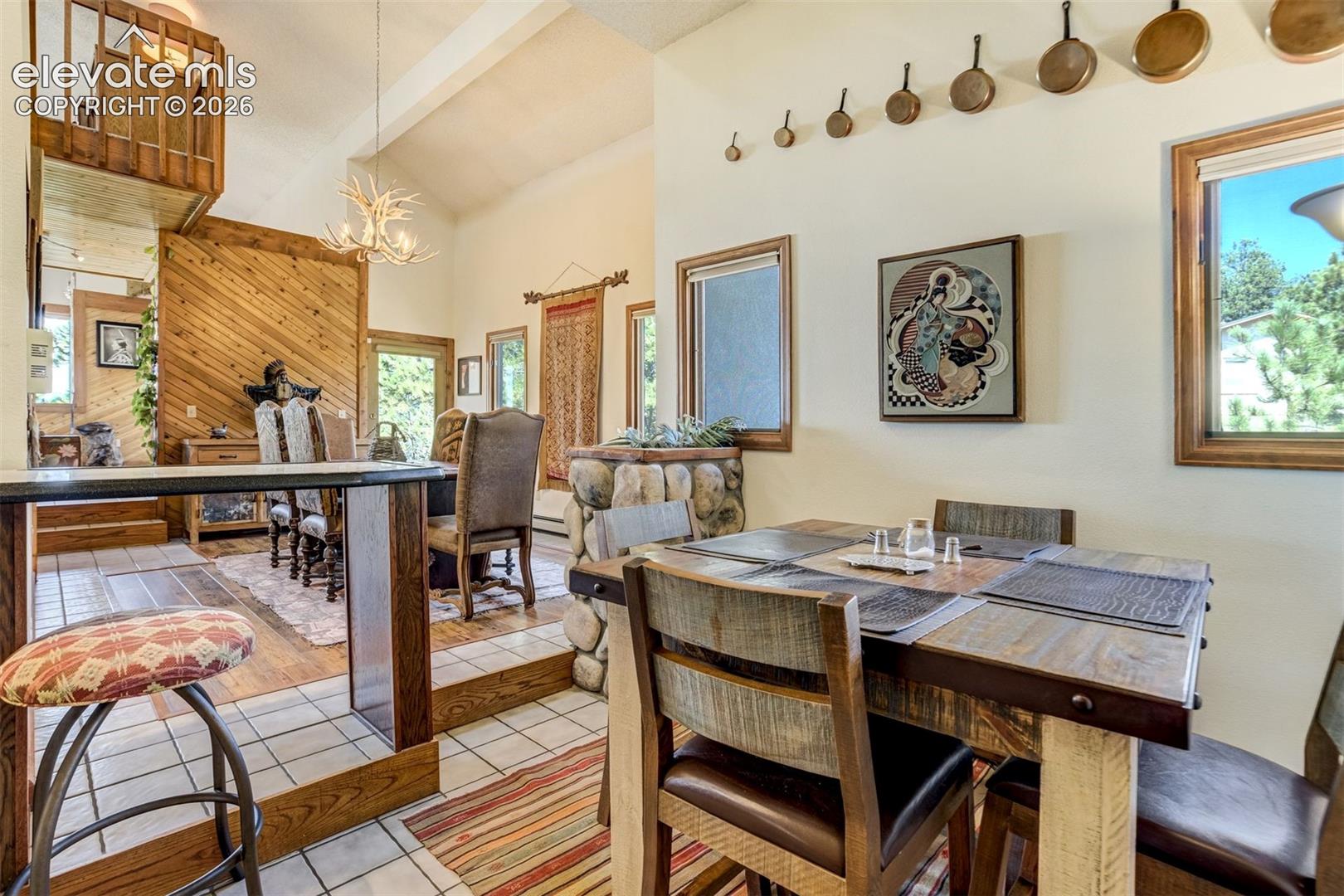 Large breakfast nook connects the kitchen and dining room