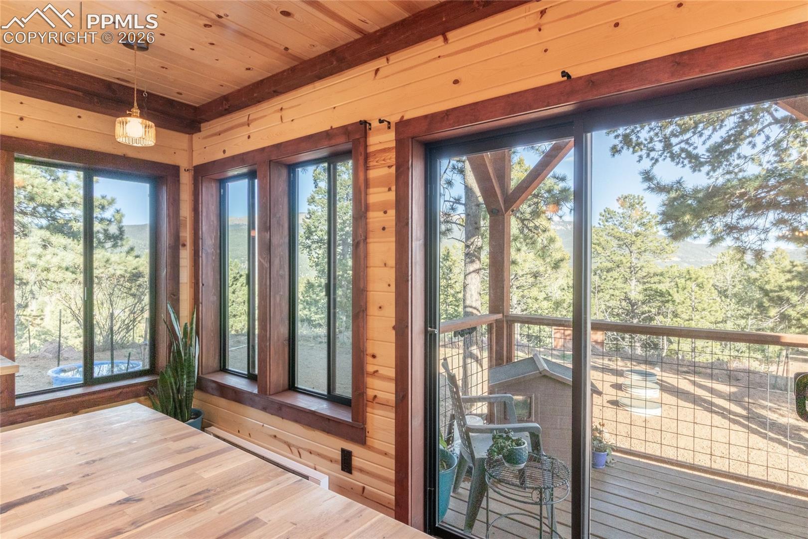 Kitchen Balcony to Fenced Yard.