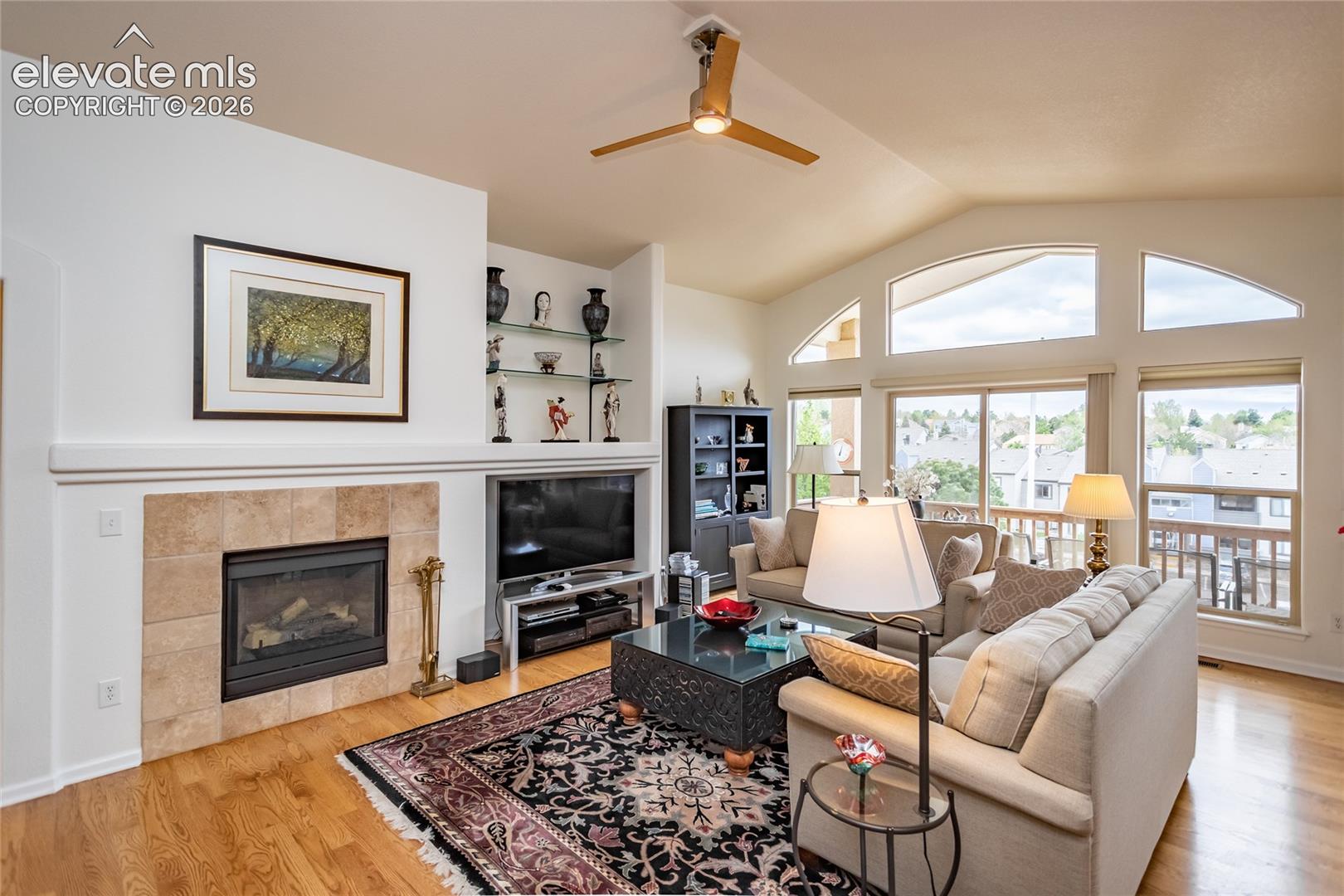 Lots of light & a cozy fireplace too.