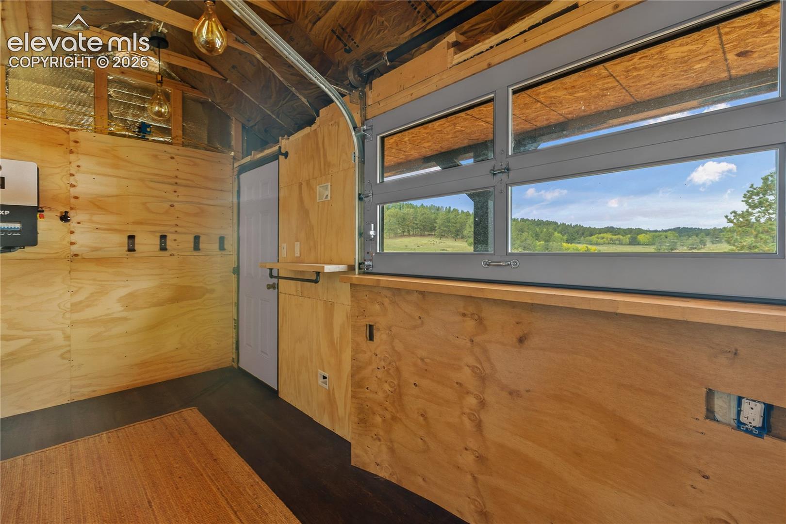 Garage door style window opens to deck