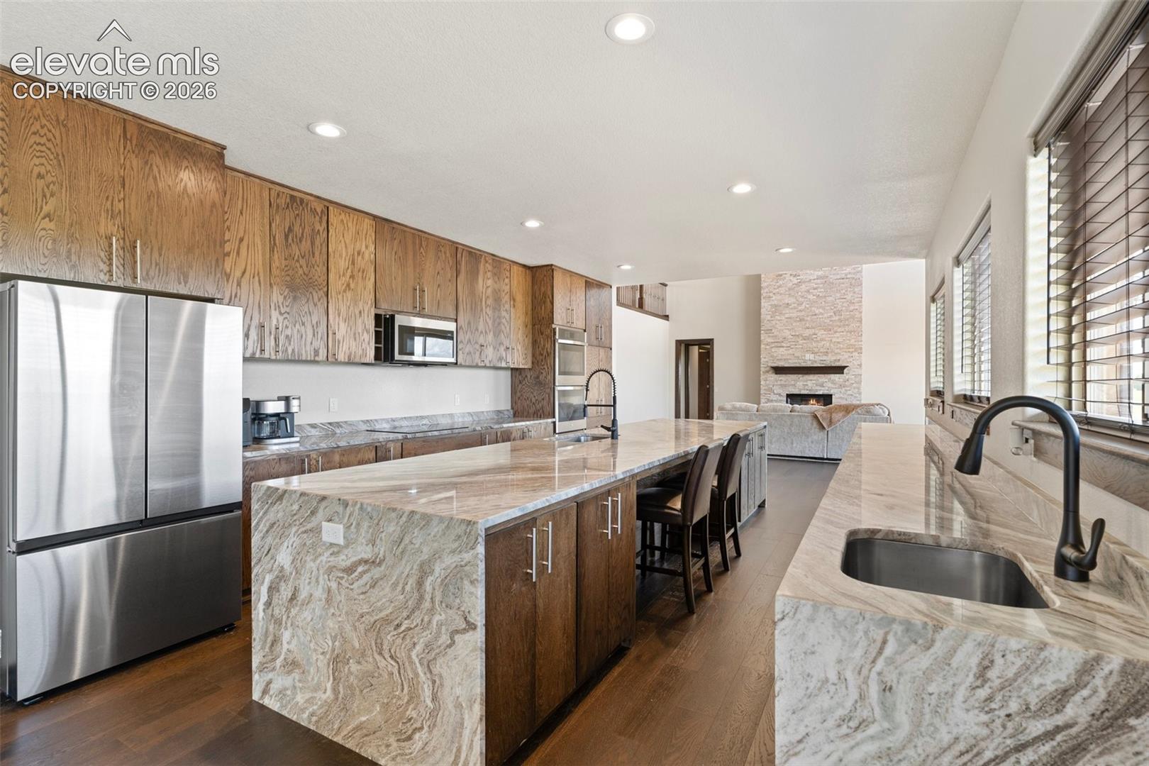 Gourmet kitchen with extensive counter space, including an oversized island and separate prep area