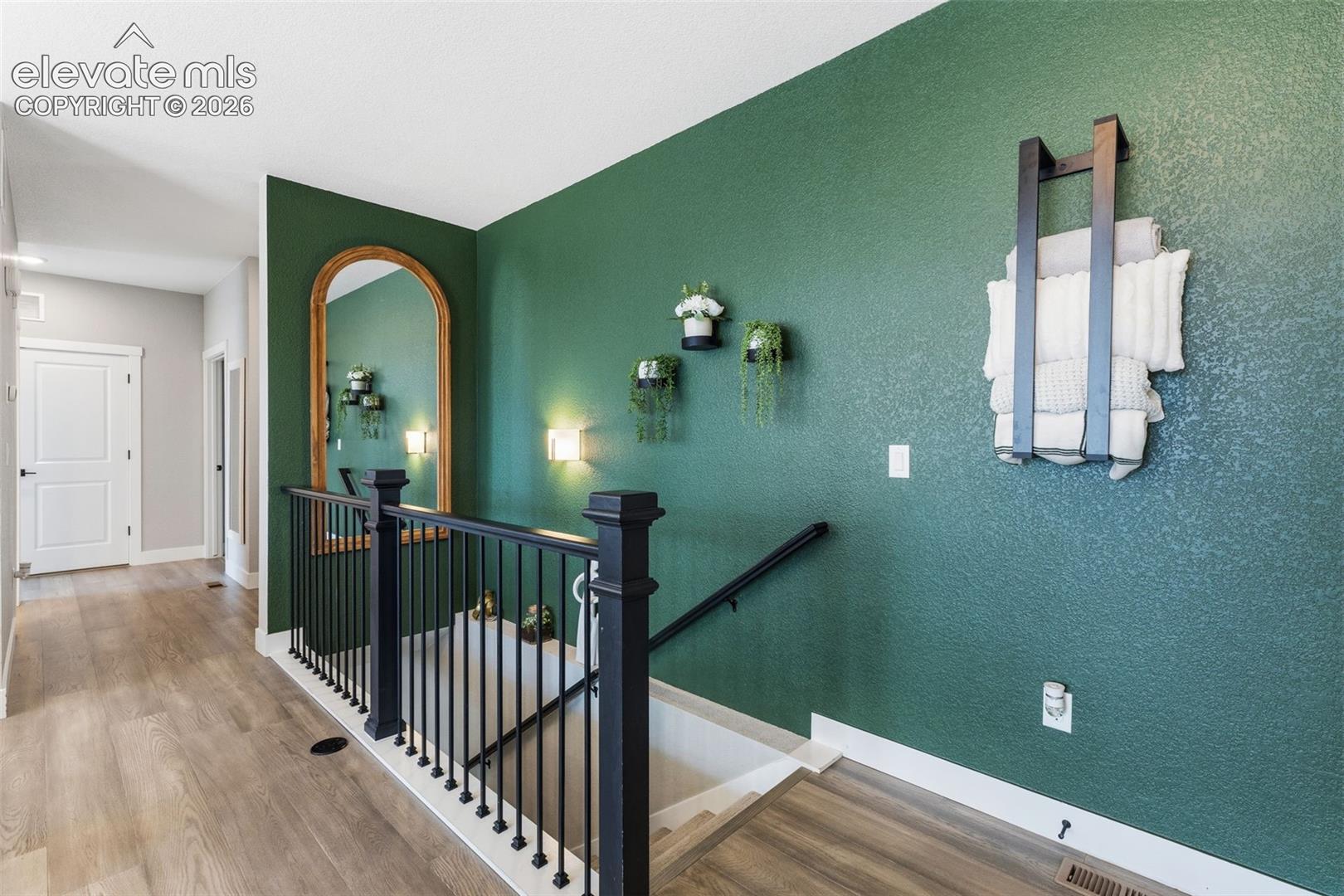 Accent wall w/ stairs to the full basement