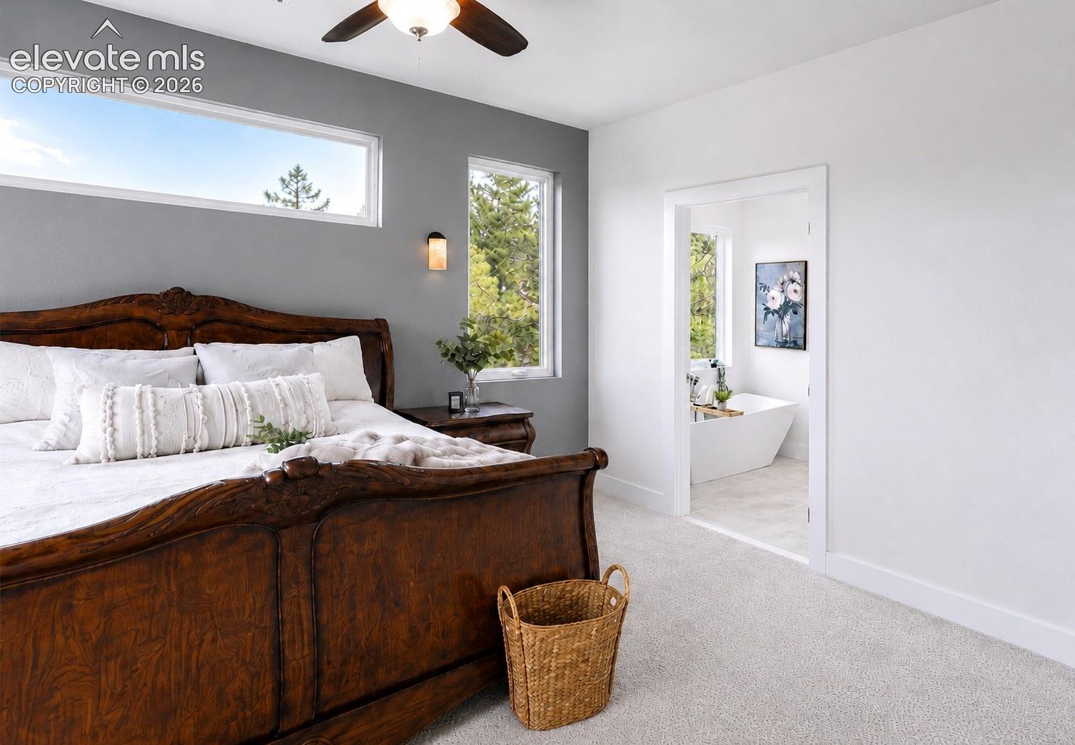 Primary Bedroom into the adjoining 5-piece Primary Bathroom.