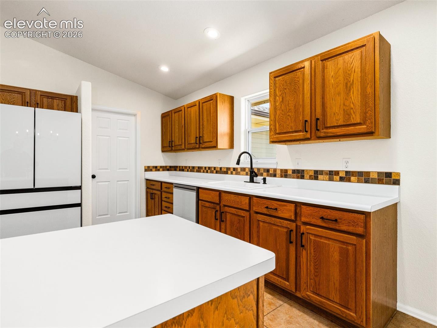 Pantry is the door in the background