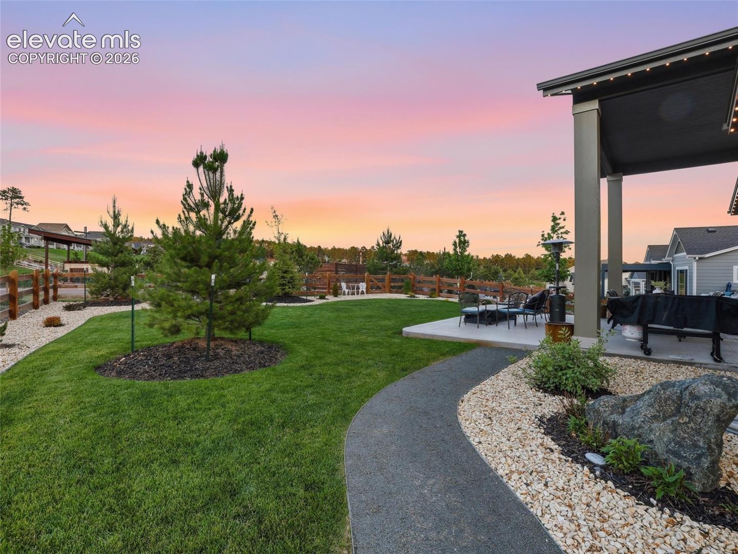 SPACE, SERENITY & A VIEW — Surrounded by open space with beautiful park views, this home enjoys a peaceful setting where nature feels like an extension of your own backyard.