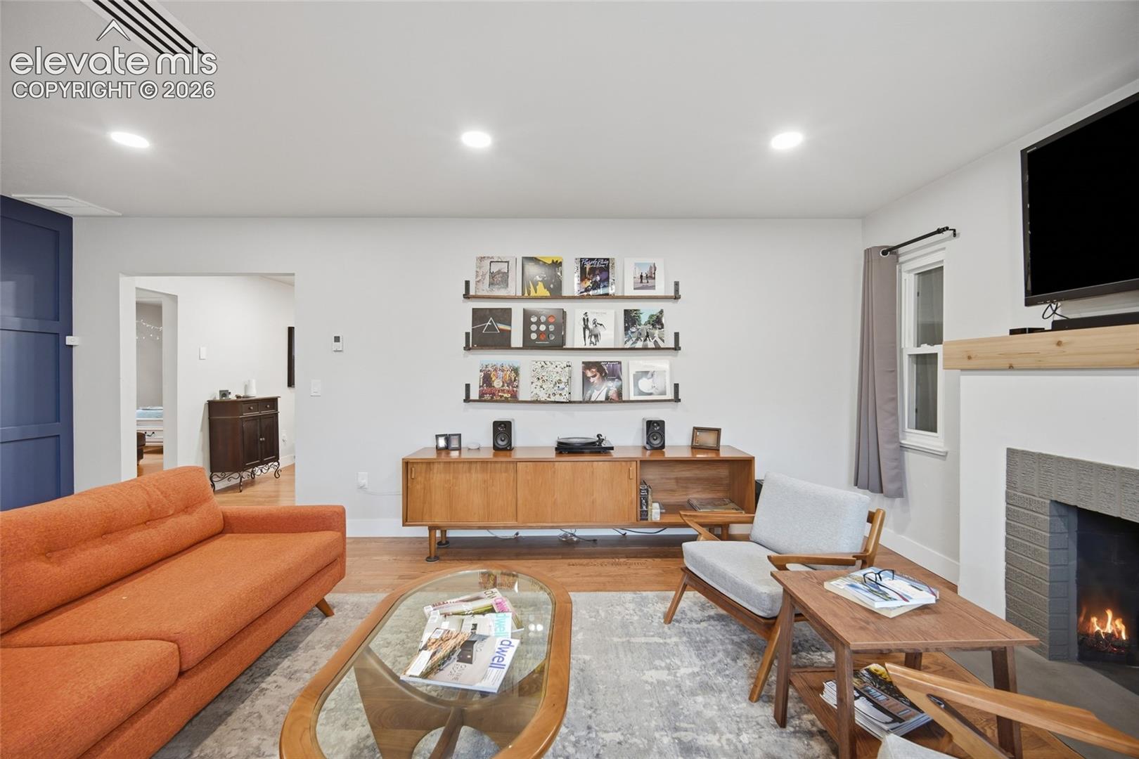 The main-floor living room is a showpiece, and a great place to show off favorite pieces from your art collection. 