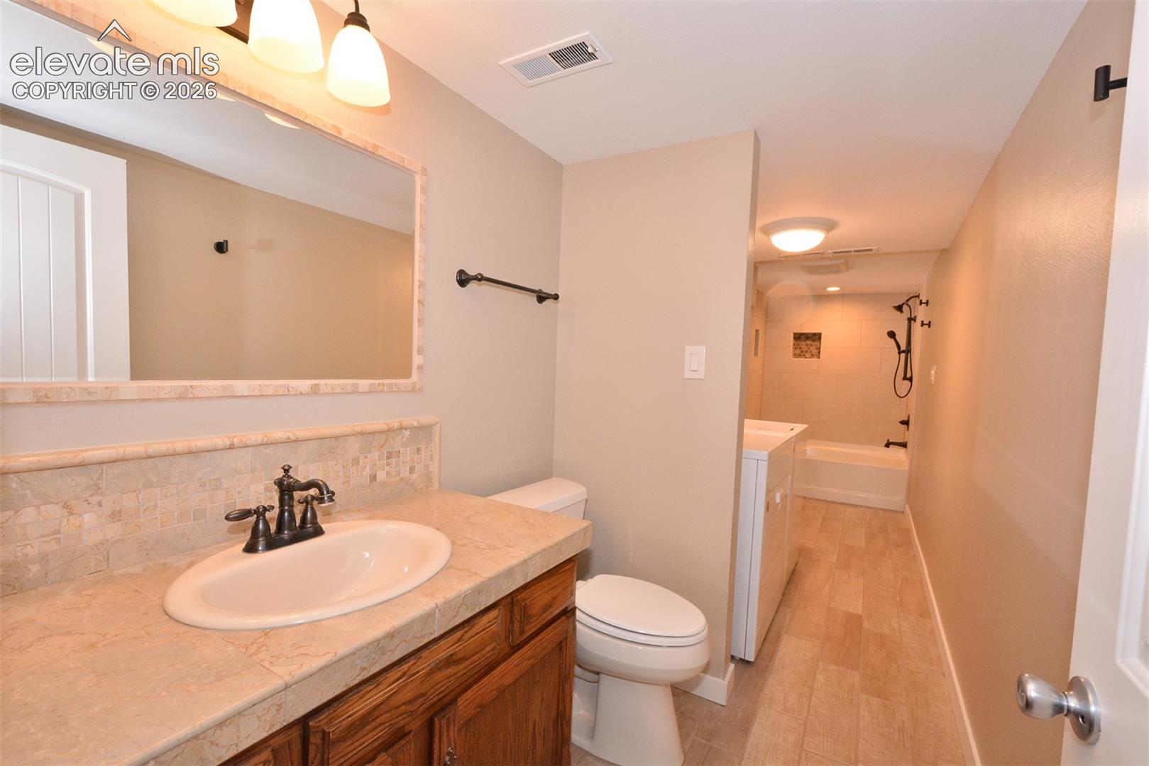 Full bath/laundry on lower level