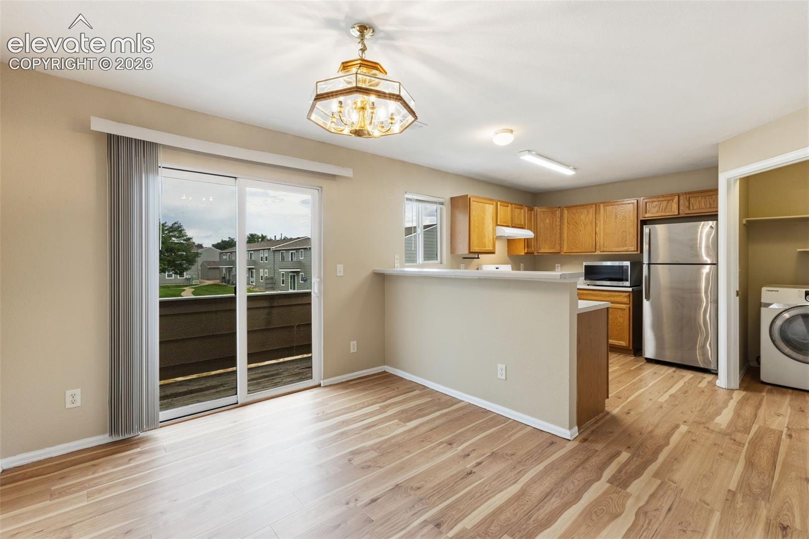 The Dining Area is  conveniently located next to the Kitchen!