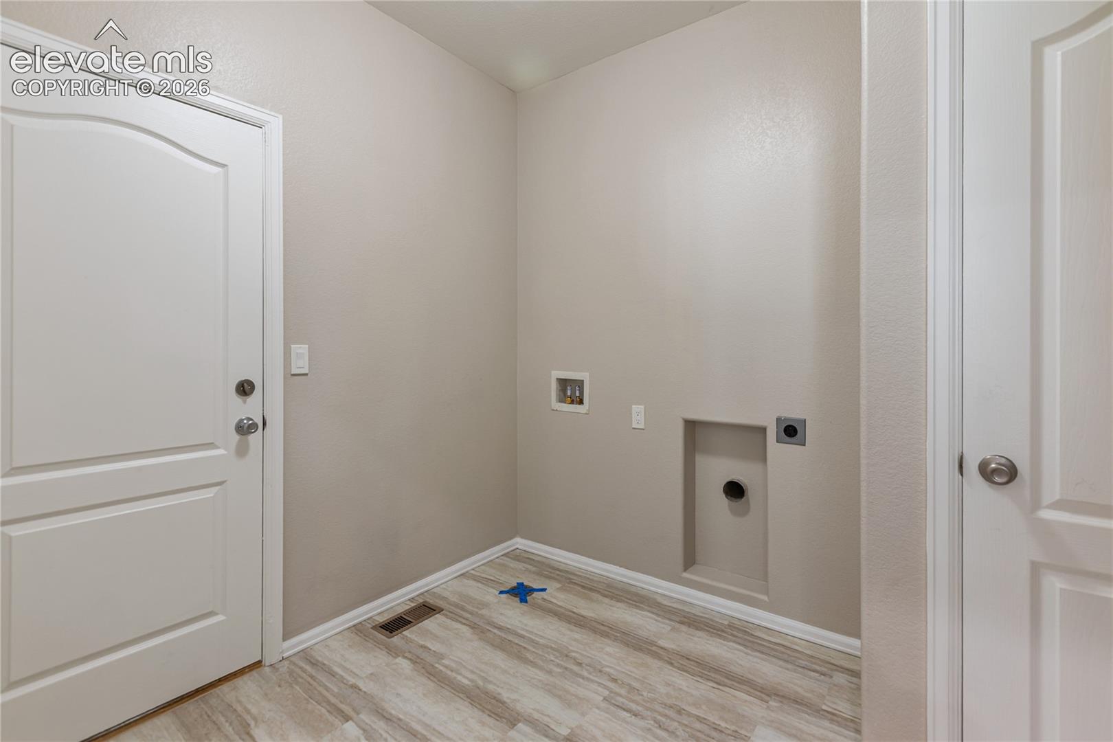 Brand new flooring in the laundry/mud room