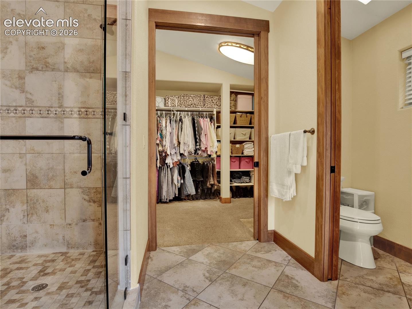 The primary bathroom comes complete with large walk in shower and private commode that leads into a huge walk in closet