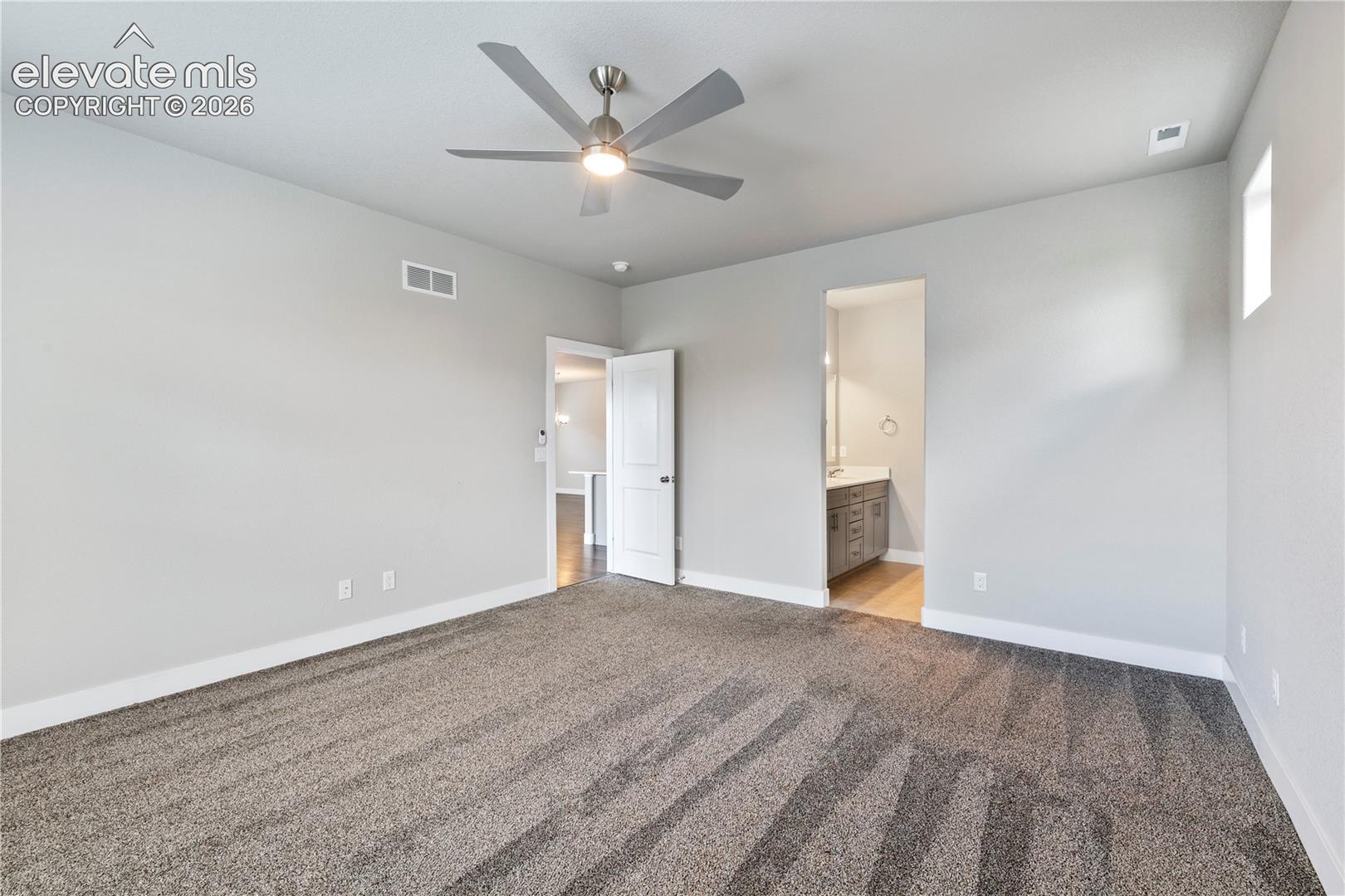 Spacious primary bedroom on main level