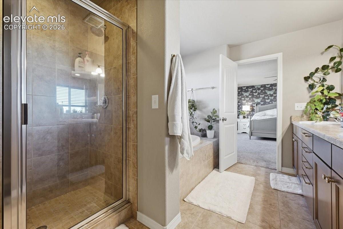 Primary Shower has a bench