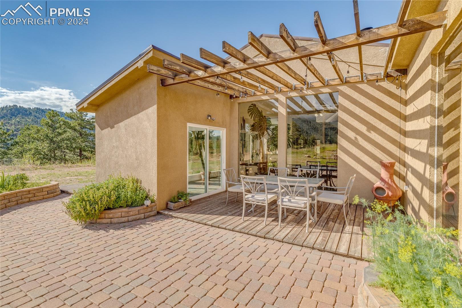 View of patio featuring a pergola