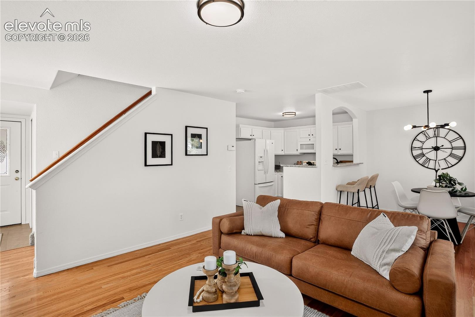 Open floor plan with kitchen / dining / living room on main level. 