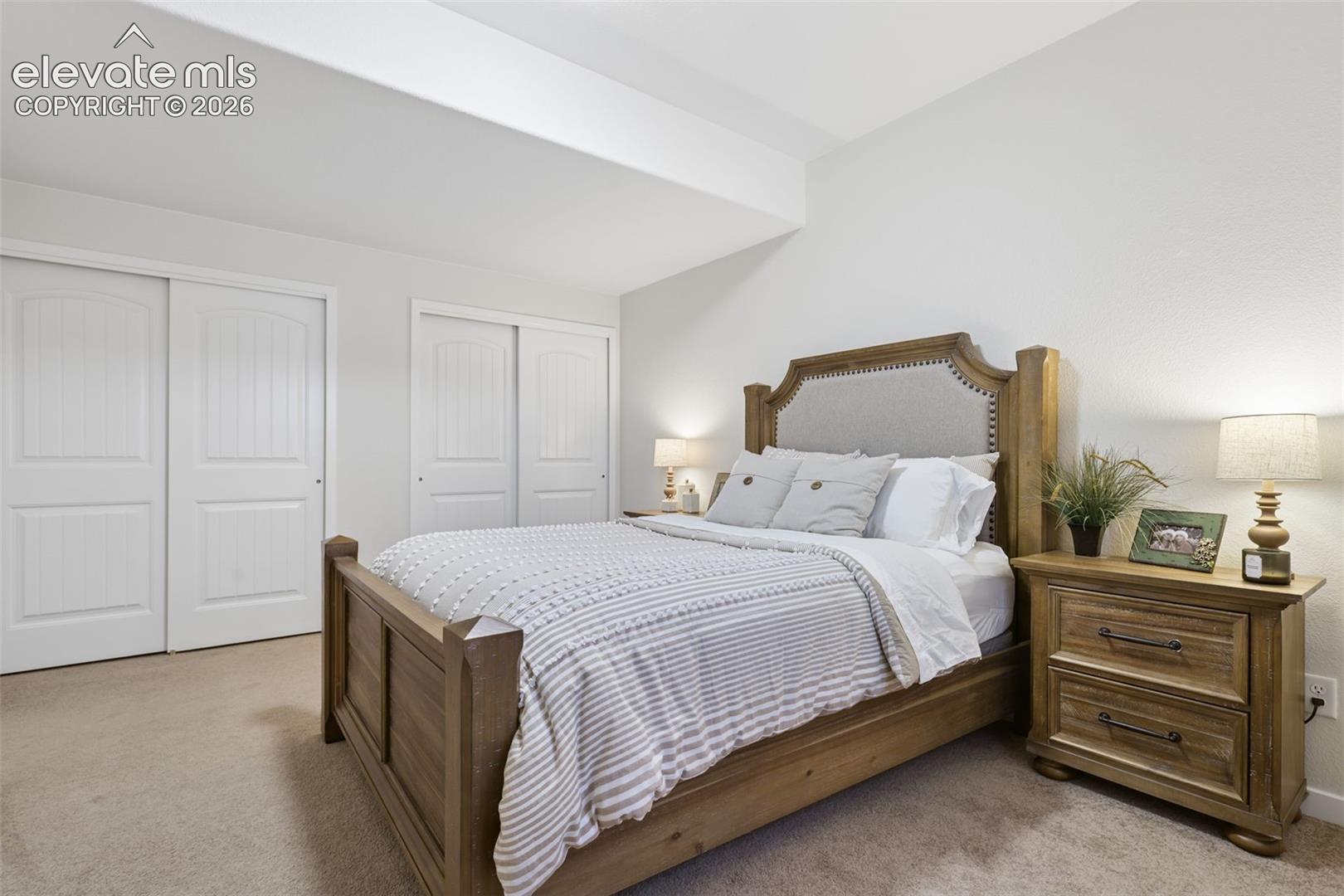 Wall-to-wall carpeting and neutral wall tones