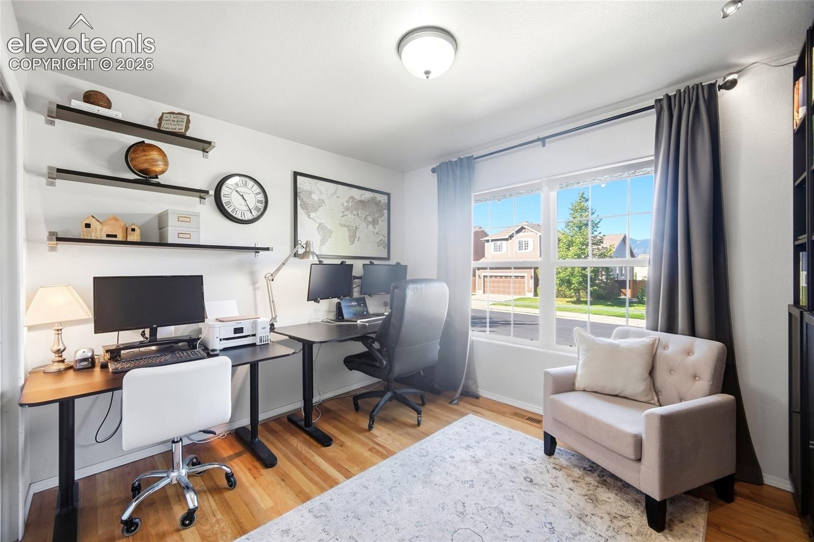 Hardwood-style flooring throughout