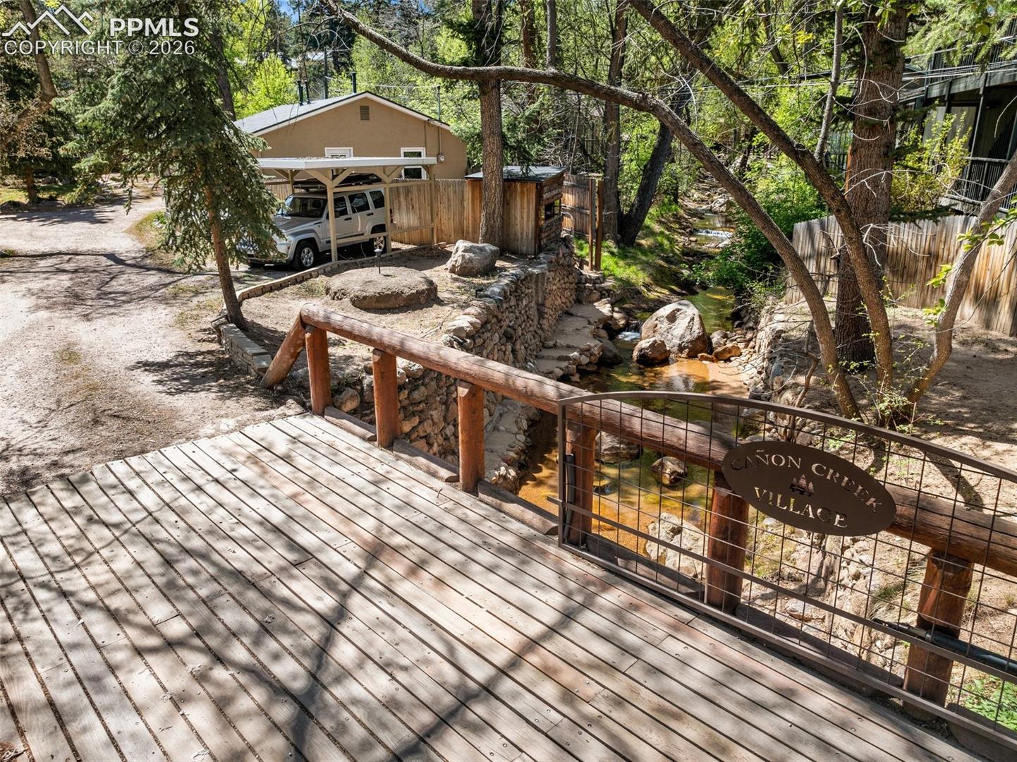 The Canon Creek Village subdivision lives up to its name with this creek as you traverse the bridge into the subdivision. 