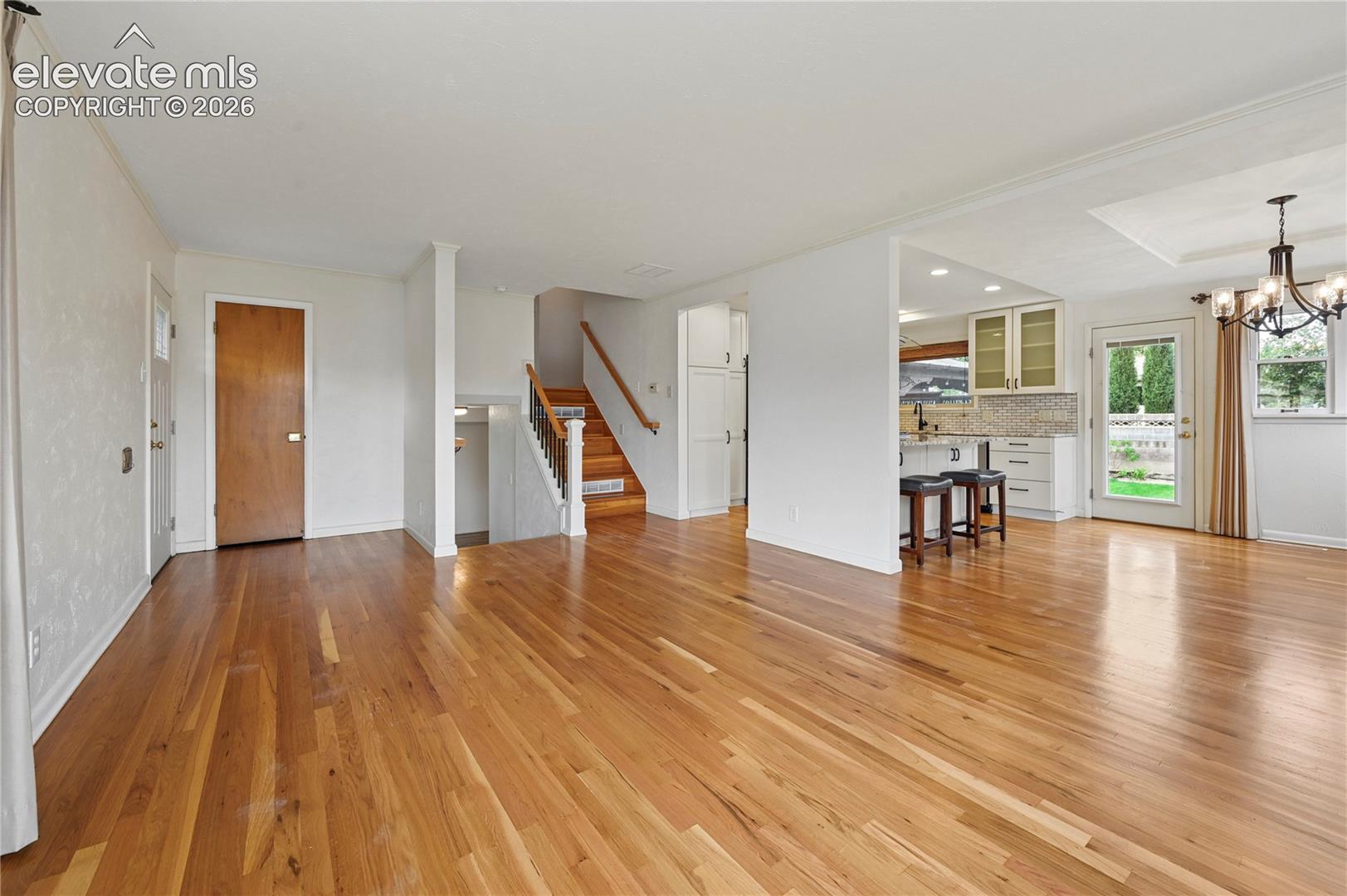 Living Room (Looking Towards Entry, Stairs and Kitchen & Dining Room)