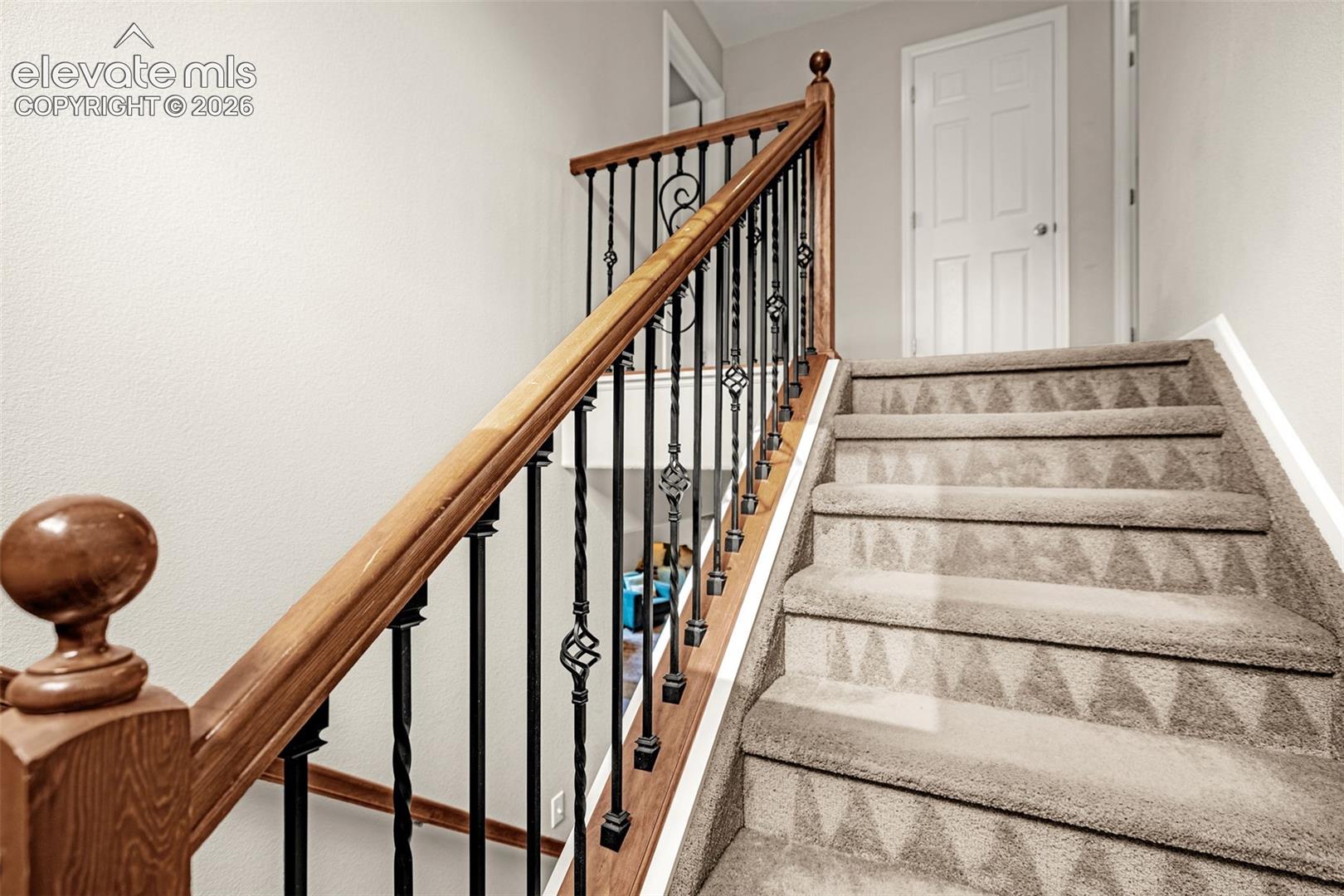 Iron ballusters along staircase