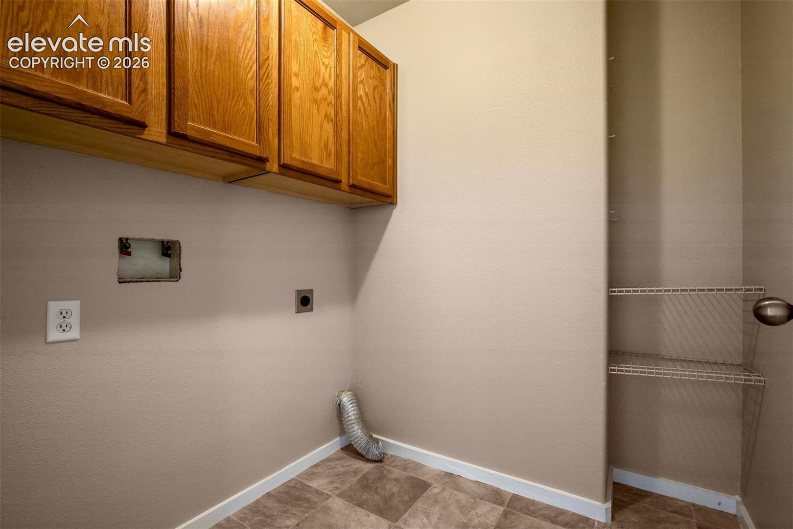 Walk in laundry with plenty of storage