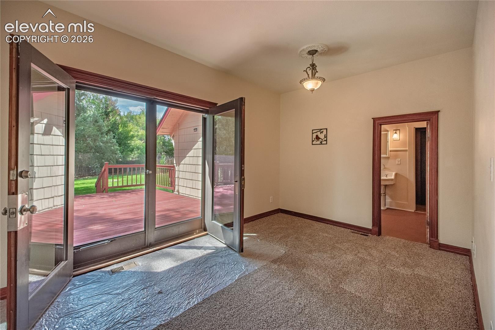 French Door Walk-Out to Huge Wood Deck