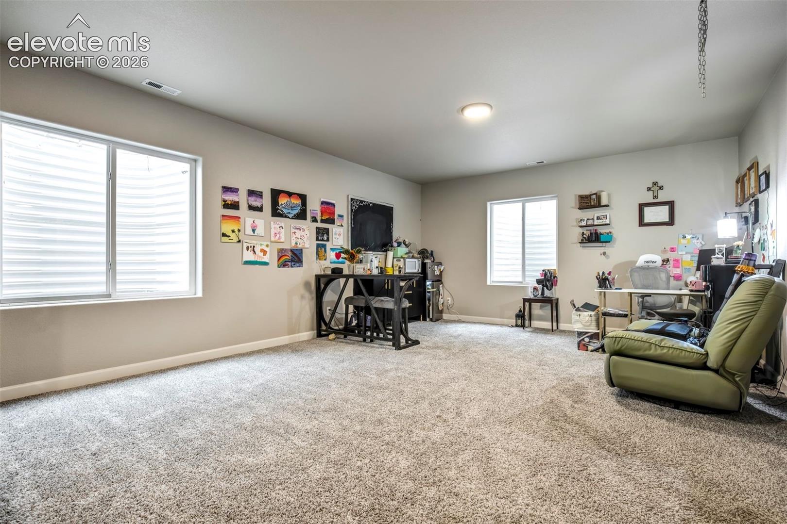 Rec room with large egress windows