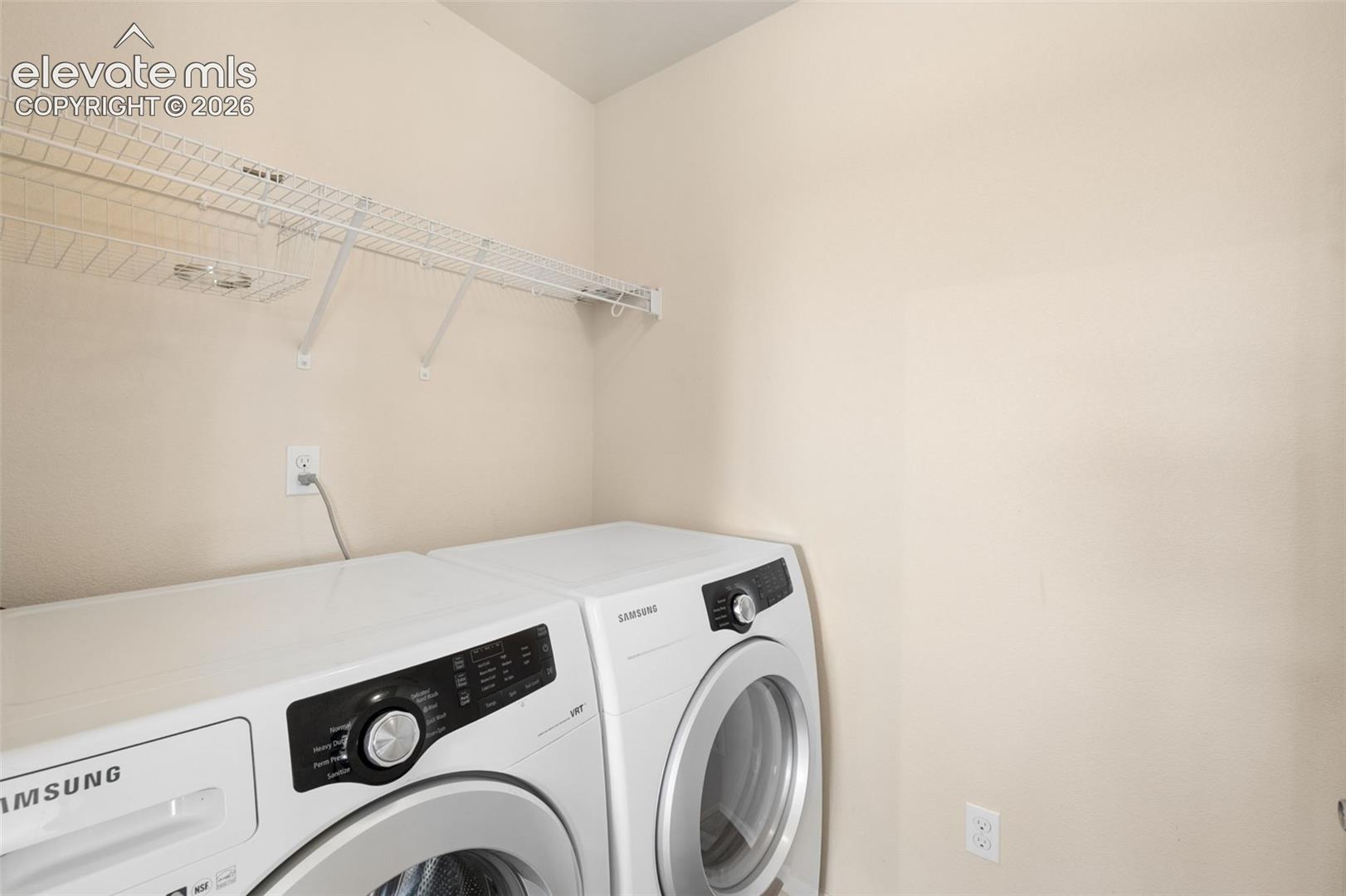 Laundry Room Located Directly Off Kitchen For Easy Access