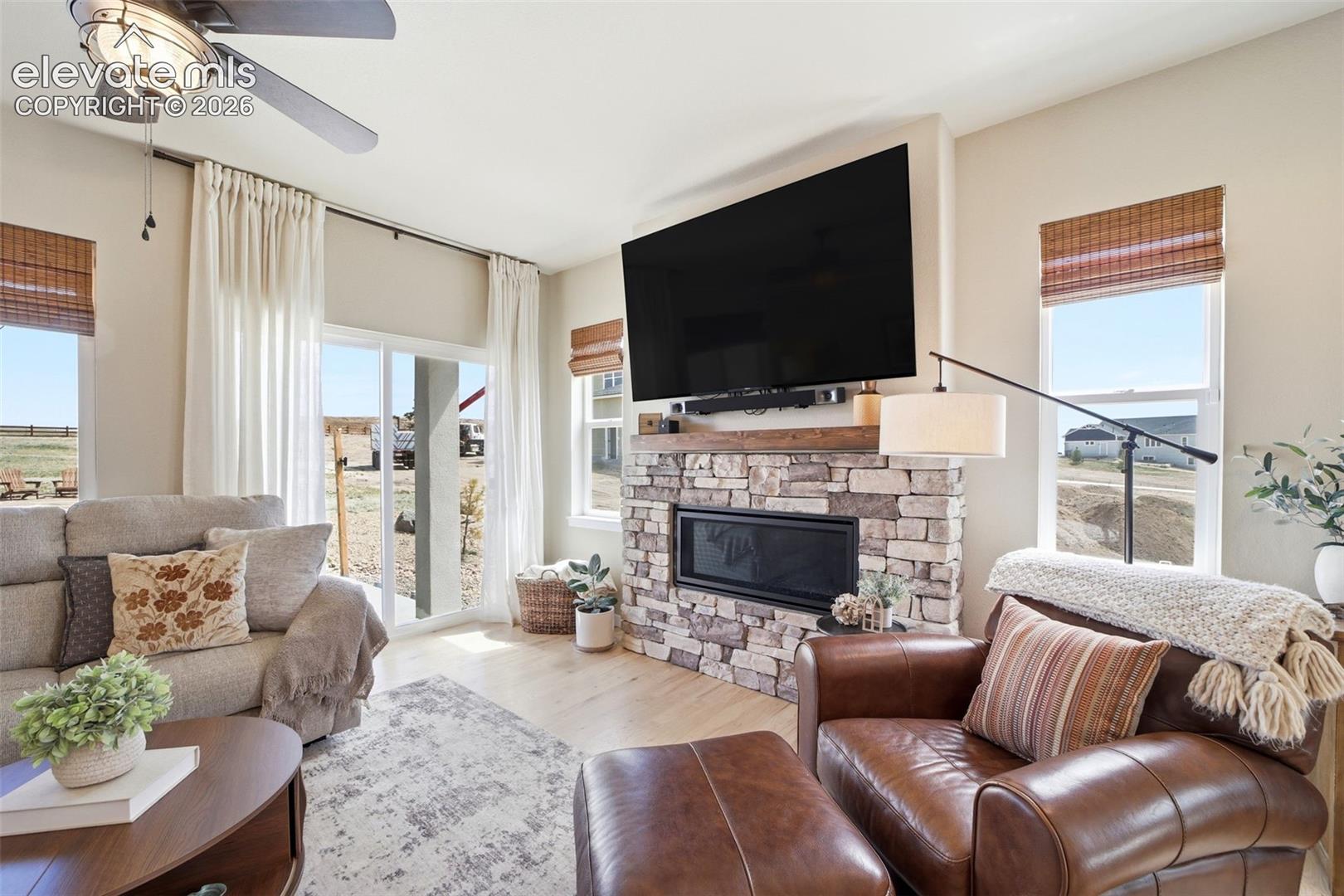 Stone fireplace with mantel for those winter nights coming. 