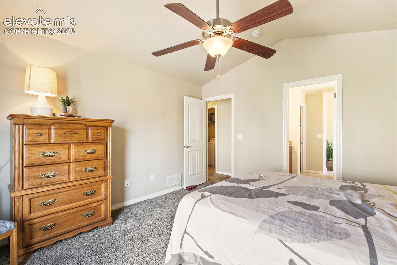 Primary bedroom with en-suite bathroom and walk-in closet