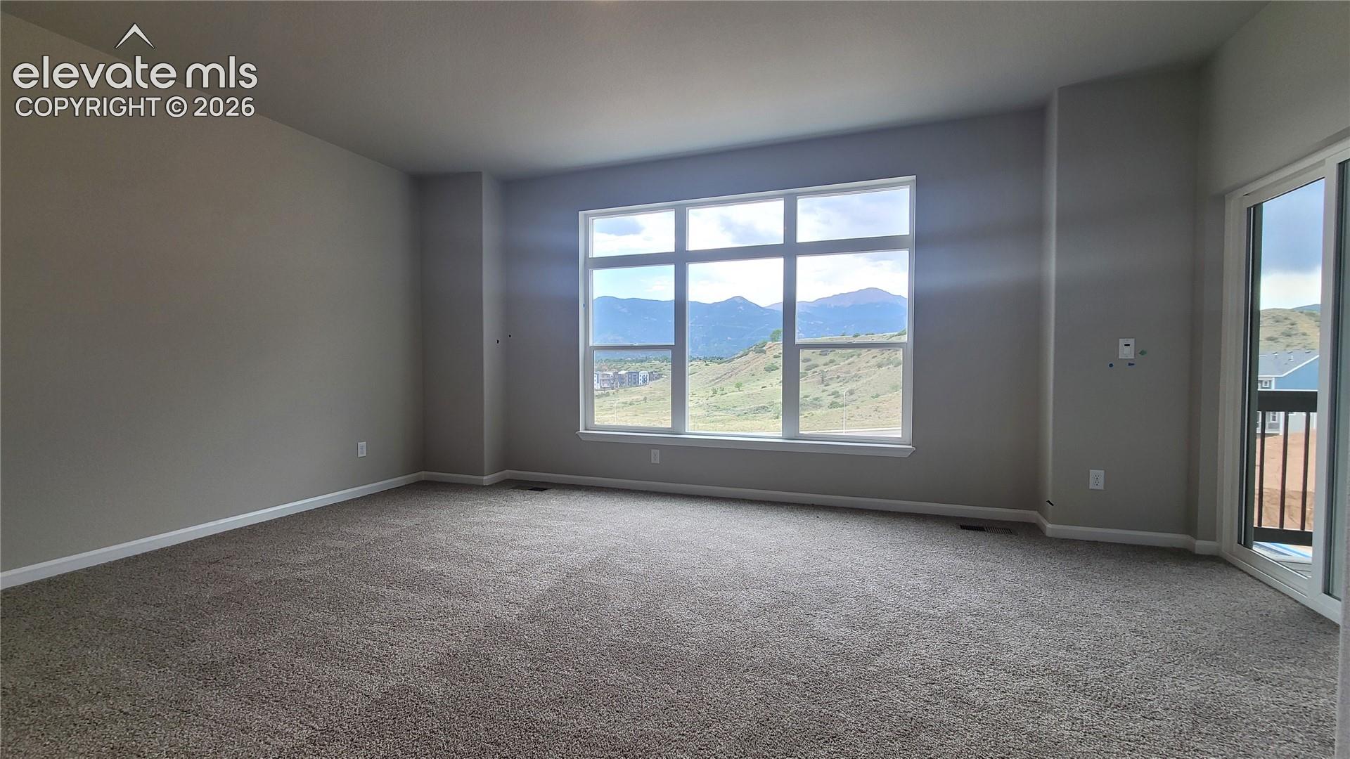 Primary Suite is accompanied with a plush bathroom, walk-in closet, private composite deck, and yields spectacular views! 