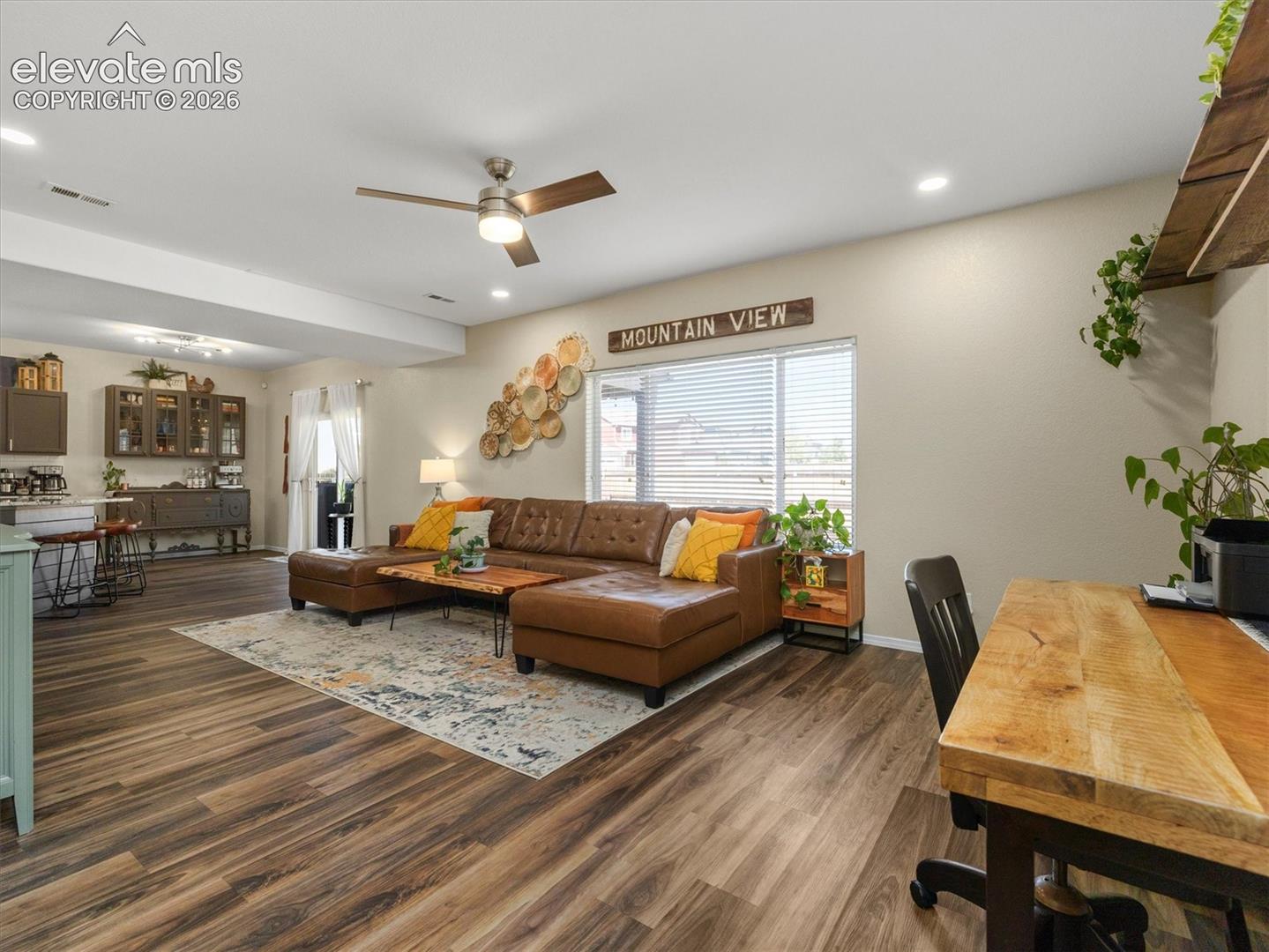 LVP flooring throughout, recessed lighting, and a ceiling fan
