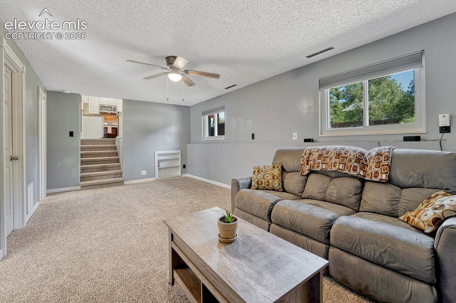 The Lower Level Living Room is spacious with lots of room for a media area, home office, or gym.