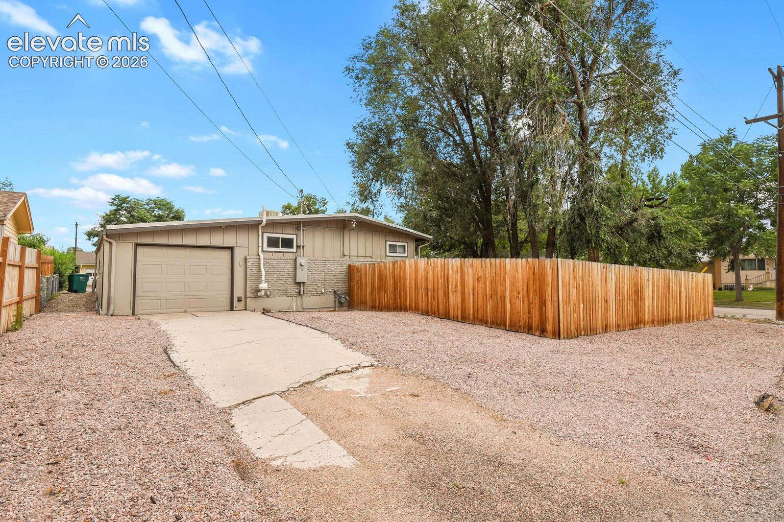 Far corner of the property showing room for RV parking.