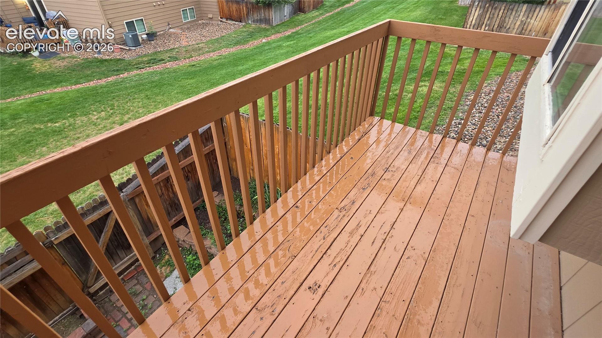 Wood-finish deck with matching railing