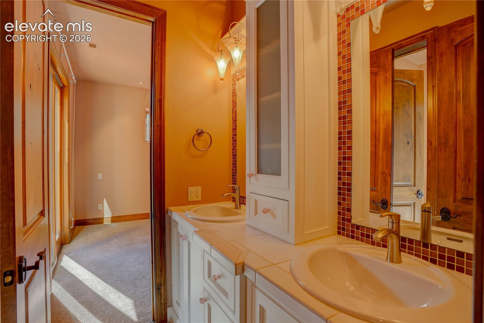 Full bath connecting 2nd and 3rd bedrooms.