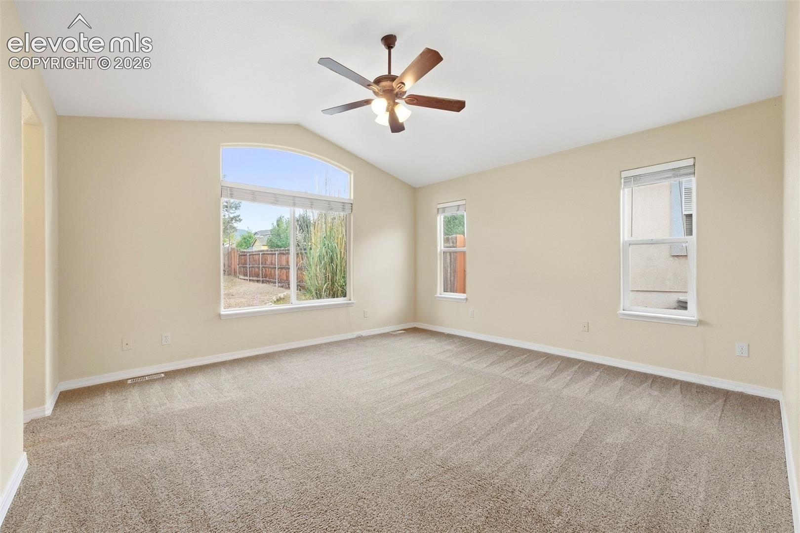 Main Level Primary Bedroom with Vaulted Ceilings