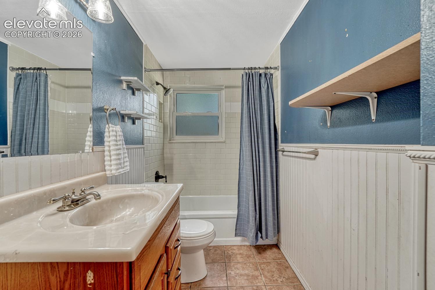 The Lower Level Full Bathroom includes a vanity, mirror, and tiled tub/shower.