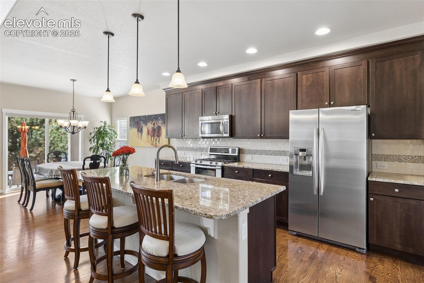 Beautiful kitchen with granite counters and stainless appliances