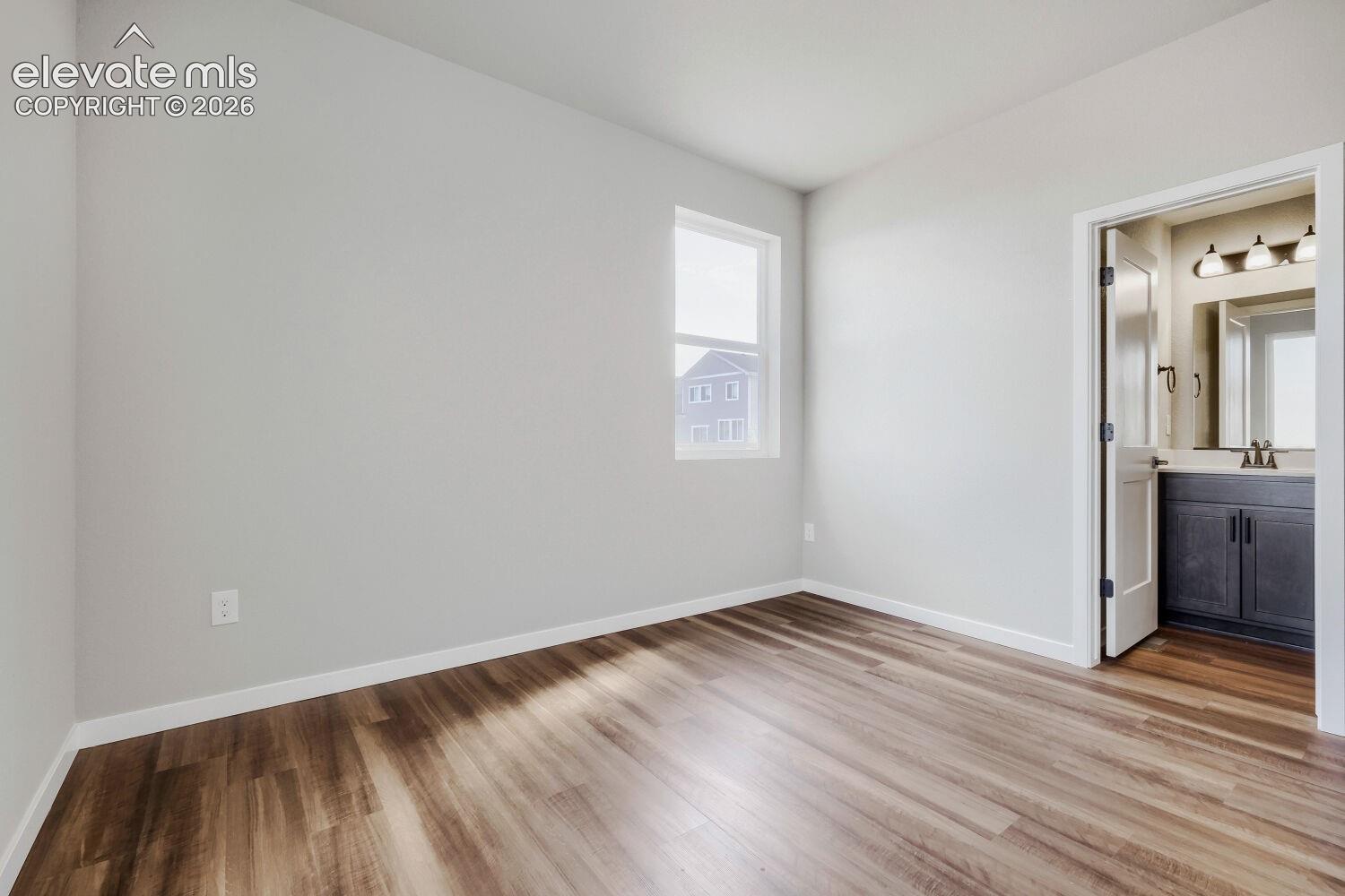 Main floor bedroom with attached bathroom