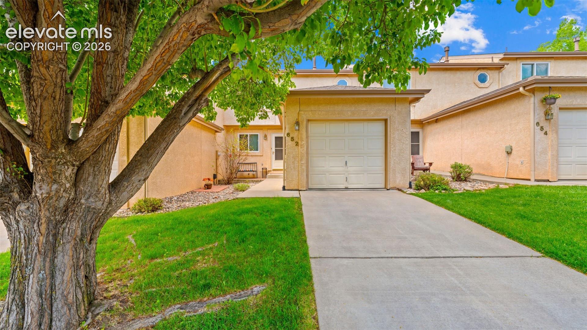 Front Exterior Entrance and Garage with Extended Concrete Apron