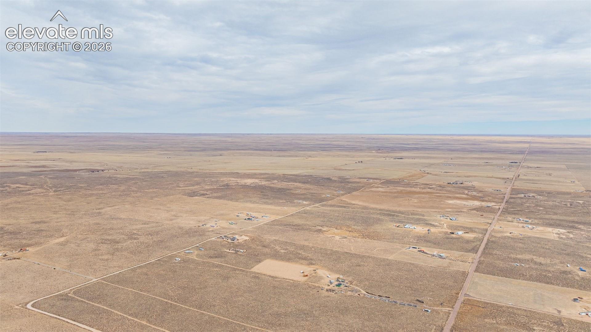Expansive open acreage featuring unobstructed horizon lines and natural topography