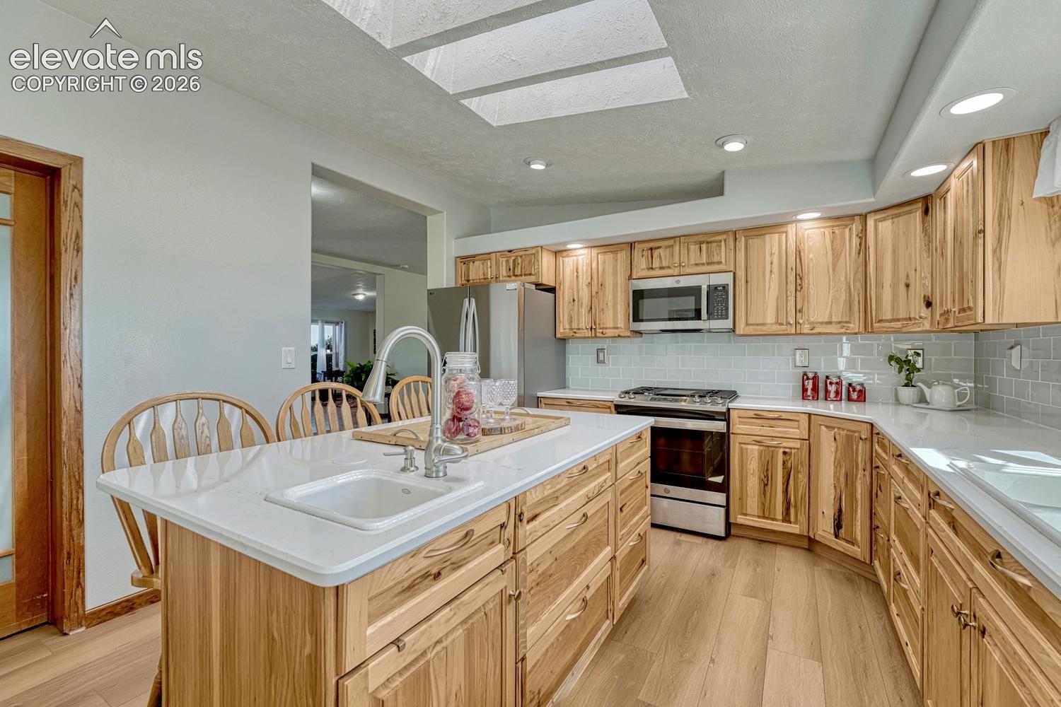 New kitchen, new appliances, new cabinets with beautiful quartz counters