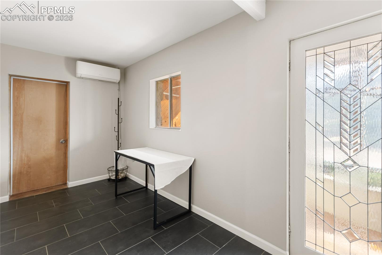 Gives access to the garden sunroom and garage!