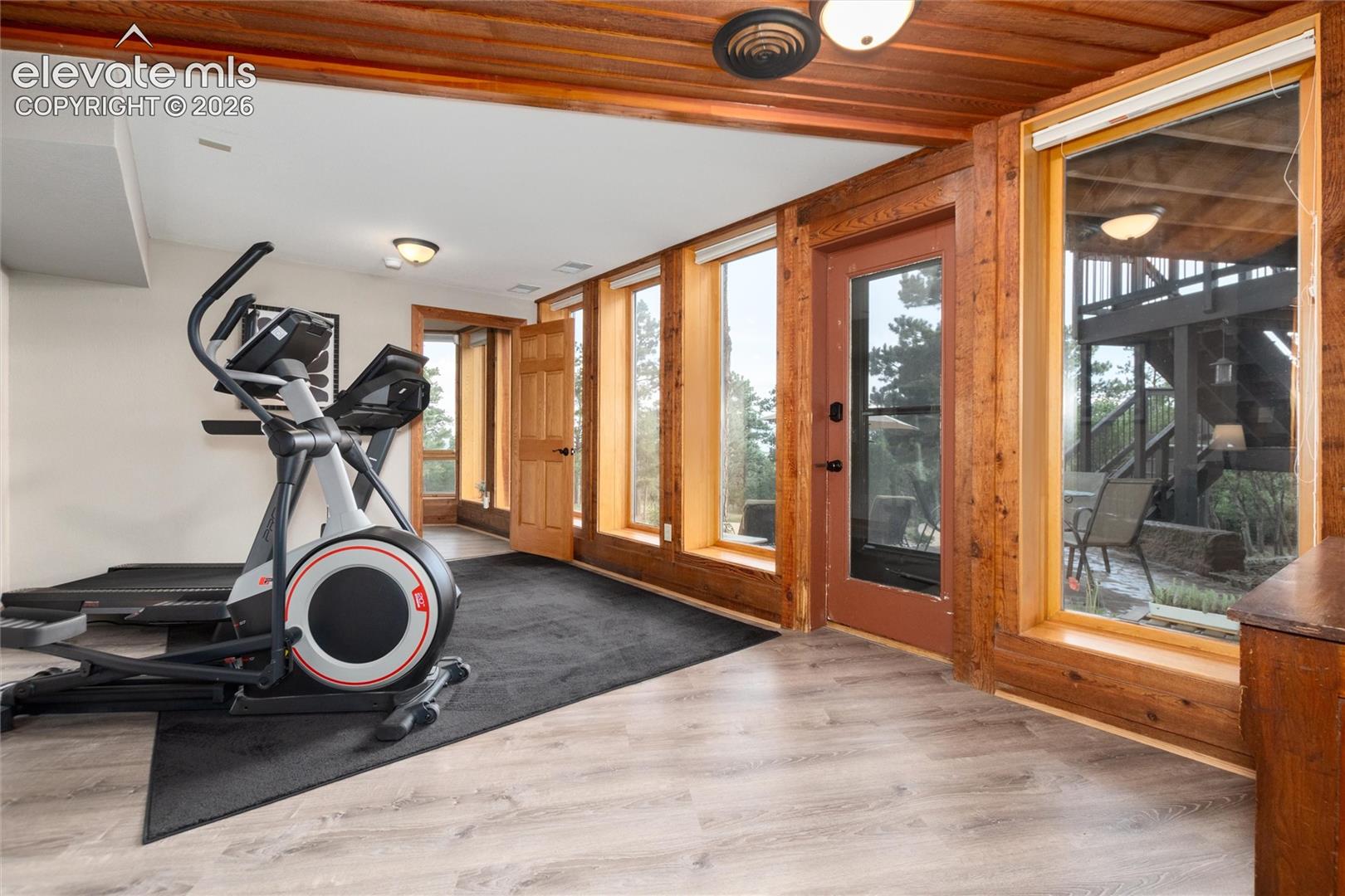 Lower bedroom being used as an exercise room