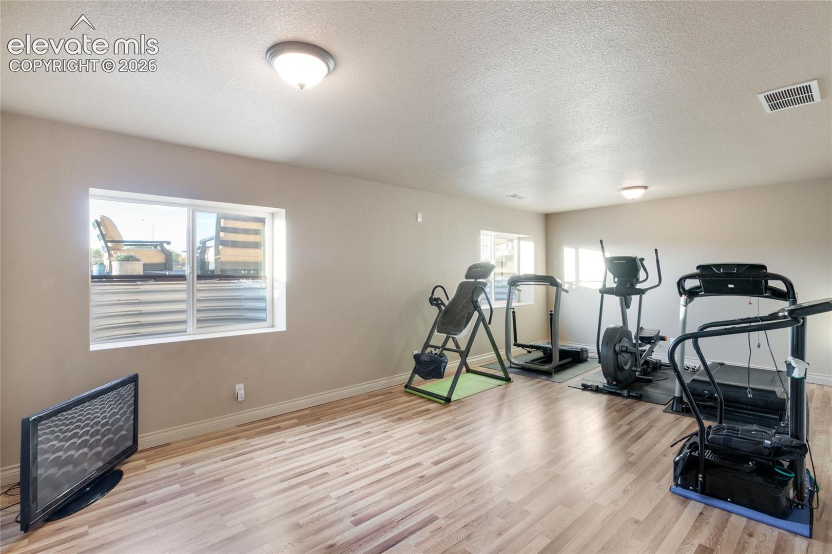 Basement family room with new LVP flooring (entire basement has new LVP flooring)