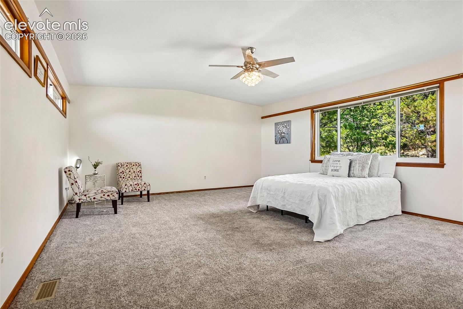 There is space for a sitting area, an office or workout space in the primary suite.