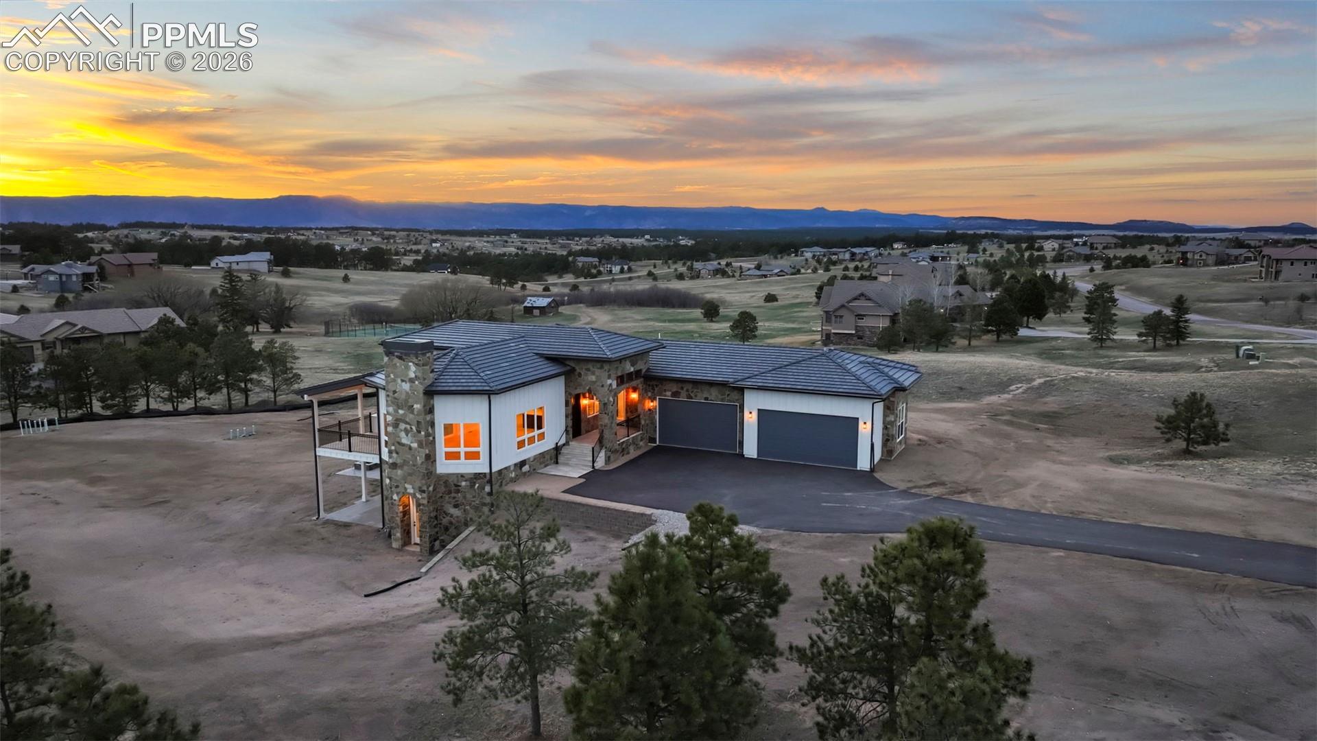Aerial view at dusk looking northwest.