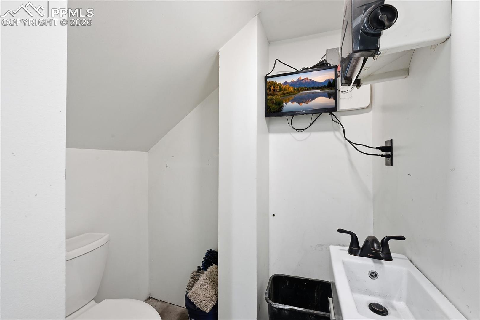 Workshop 1/2 bathroom and monitor to the hardwired cameras.  